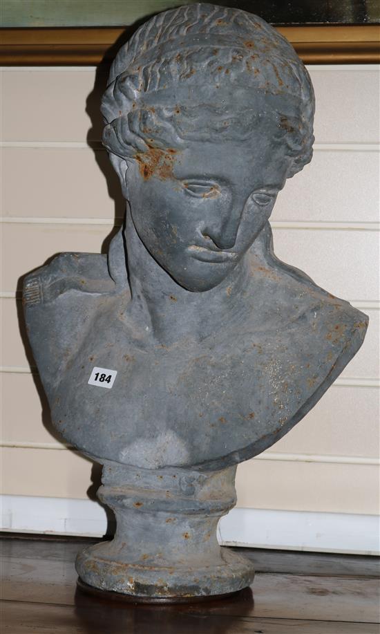 A metallic bust of Venus